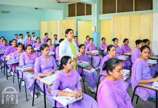gn-nursing-college-classroom-low-right-angle-teacher-walking-watermark