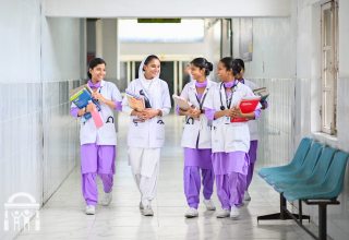 nursing-students-college-books-hallway-walking-talking-clinical-watermark
