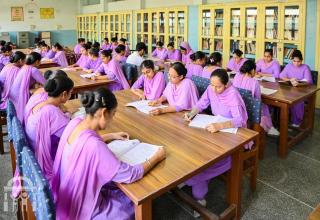 nursing-students-studying-college-library-full-room-front-watermark